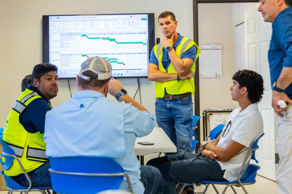 ANF team reviewing a project schedule during a planning meeting