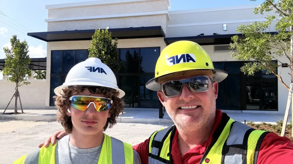 An ANF summer intern and mentor at a completed ANF project site